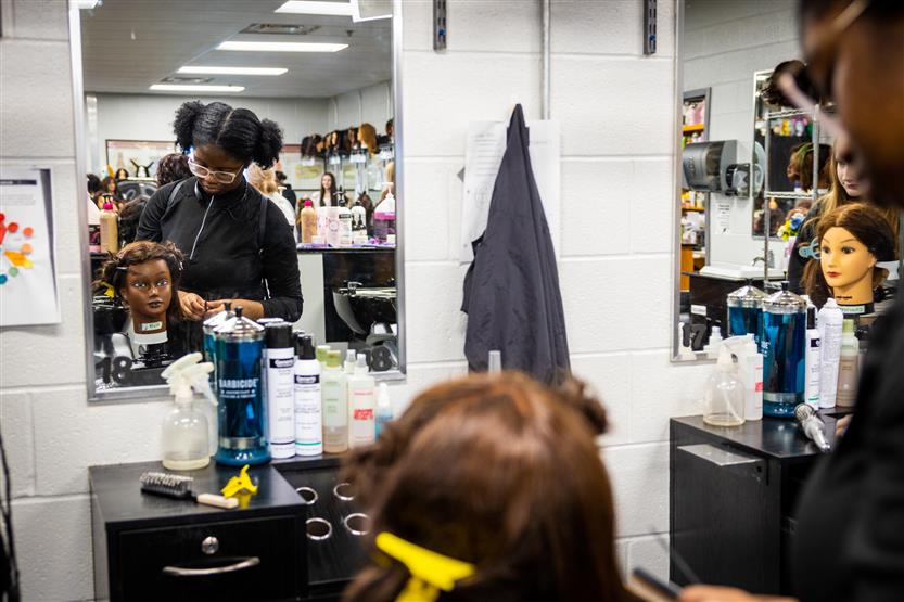 Centennial High students in the cosmetology class